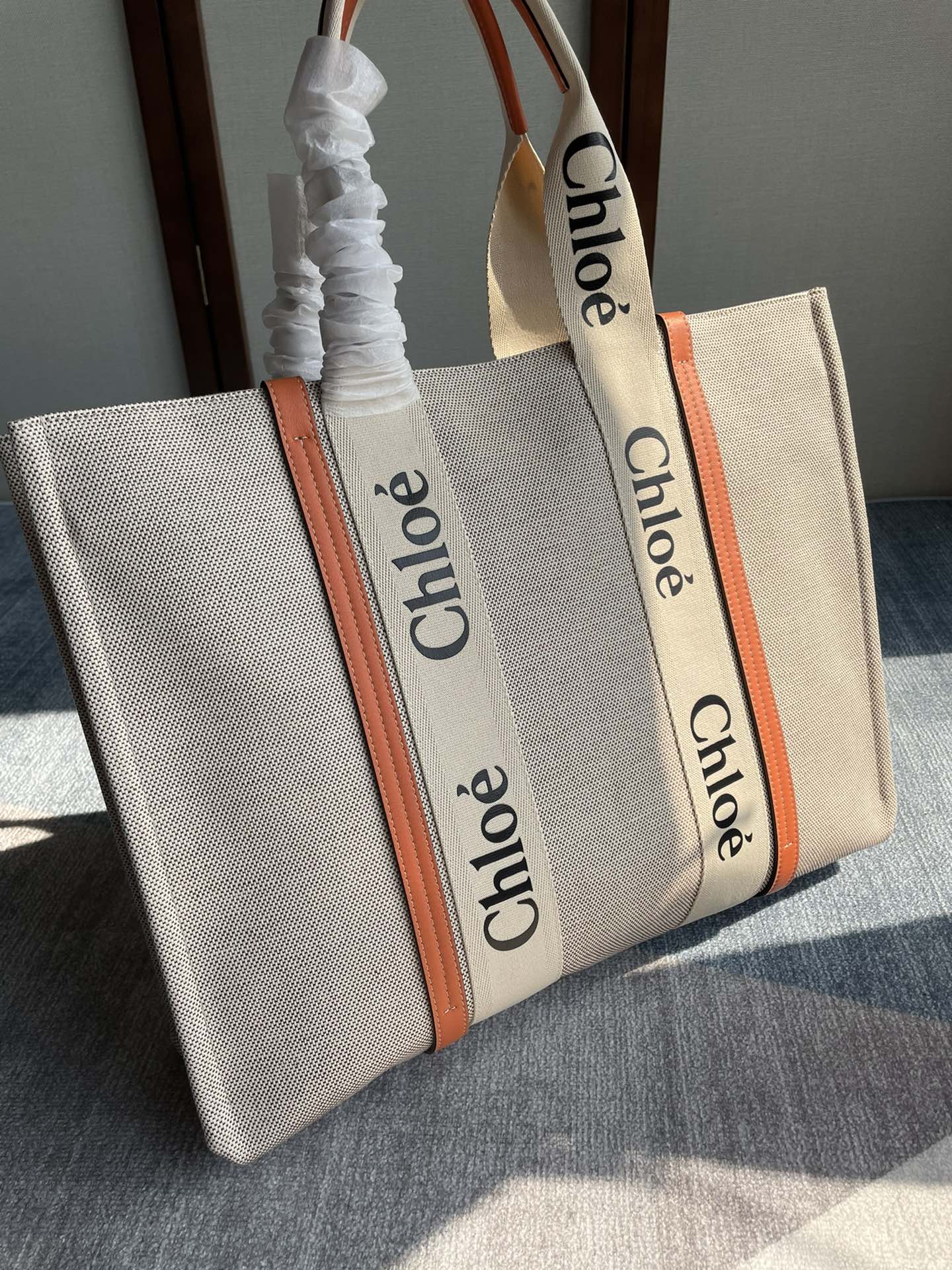LAGRE WOODY TOTE BAG 45 IN BEIGE LINEN CANVAS BLACK WEBBING LOGO EMBROIDER ORANGE CALFSKIN