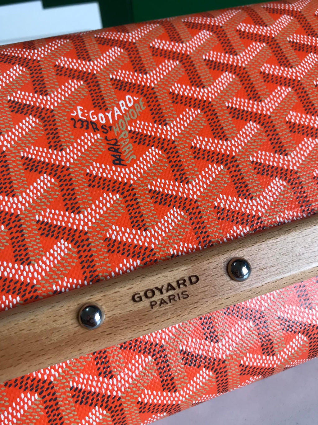 MONTE-CARLO PM CLUTCH 25 IN ORANGE GOYARDINE CANVAS