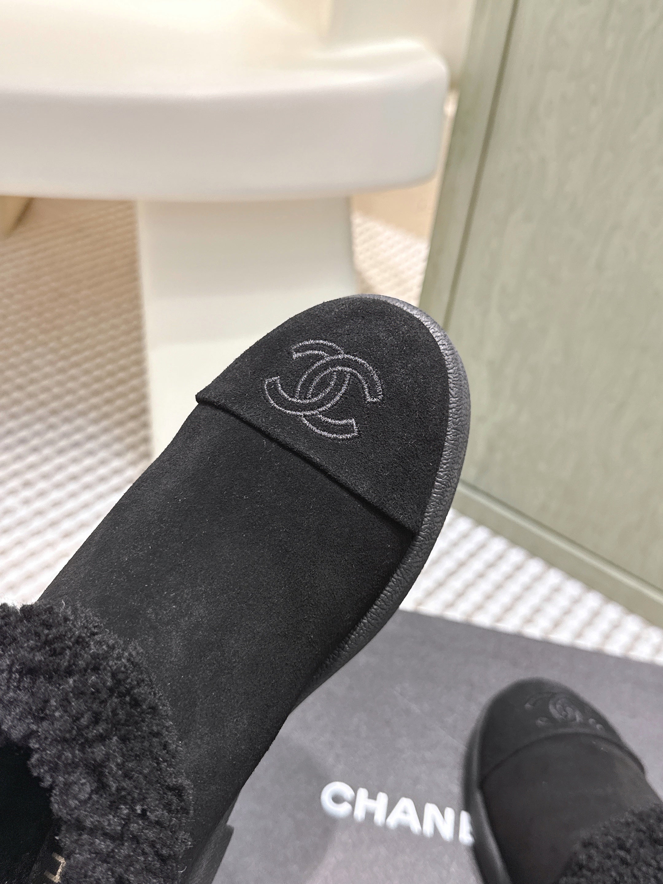 CHANEL 25S SHORT SUEDE BOOTS IN BLACK WITH SHEEPSKIN LINING