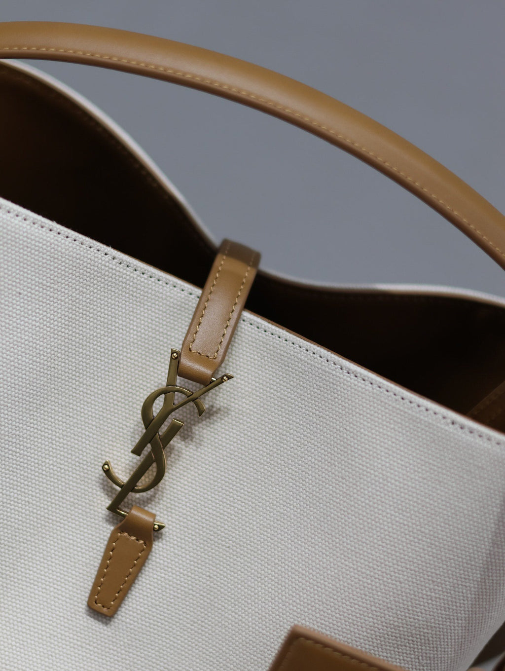 YSL 25S LE 5 À 7 BUCKET 26 IN CREAM BROWN CALFSKIN AND CANVAS GOLD HARDWARE